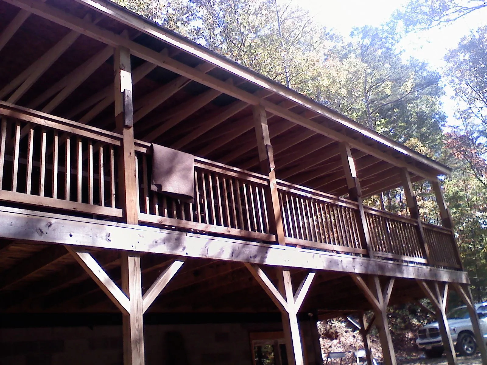 Timber framing under a new elevated porch and deck — Roof Leak Repair in Nemacolin by Roofing Brothers
